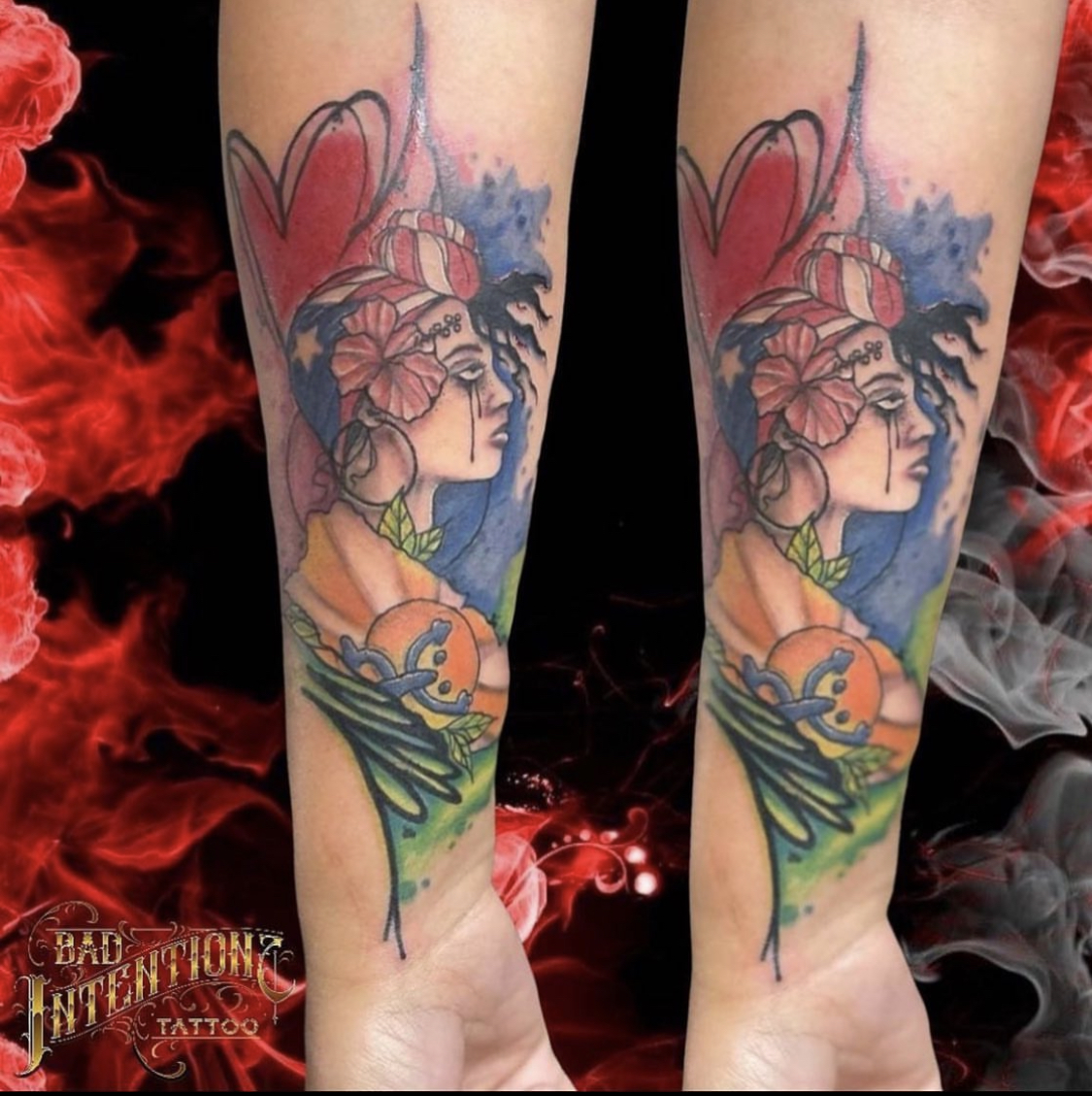 Watercolor color forearm tattoo of a woman with hibiscus and Puerto Rican flag by Bad Intentionz Tattoo, Bloomfield NJ